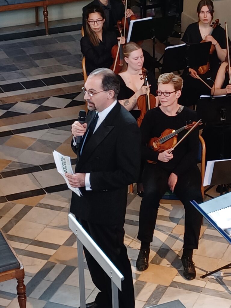 Presenting a John Williams concert with the Akademiska Kapellet, Lund University, 2023